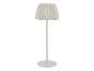Lampadaire blanc avec un abat-jour plissé et une base ronde