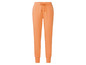 Pantalon de jogging orange avec le logo Tommy Hilfiger.
