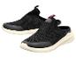 Chaussures de sport noires sans lacets à semelle blanche
