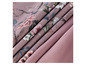 Tissus dans des tons roses avec un motif floral