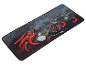 Tapis de cuisine rectangulaire avec imprimé de piments rouges et d'épices.