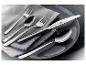 GSW Besteck-Set Classic: Couteau, fourchettes et cuillères sur une assiette grise et serviette.
