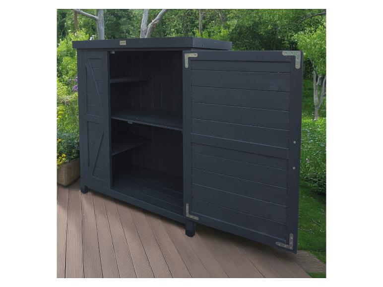 Armoire de rangement en bois foncé avec portes ouvertes et étagères, sur une terrasse en bois.