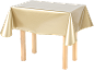 Une table avec une nappe dorée brillante.