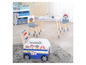 Table de jeu Paw Patrol avec des chaises, une voiture et des paniers de rangement.