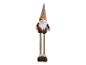 Décoration de gnome d'automne avec un grand chapeau marron, une barbe blanche et une écharpe en tricot rouge.