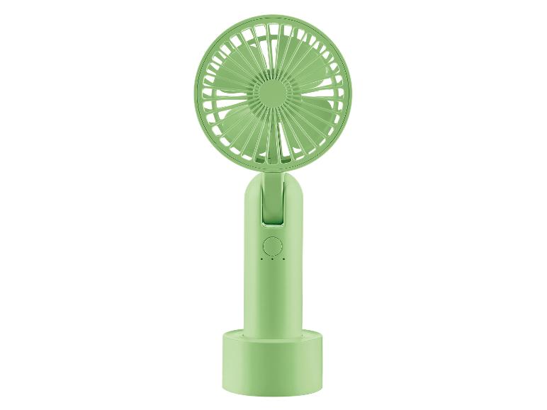 Ventilateur de poche vert pâle rechargeable sur base.