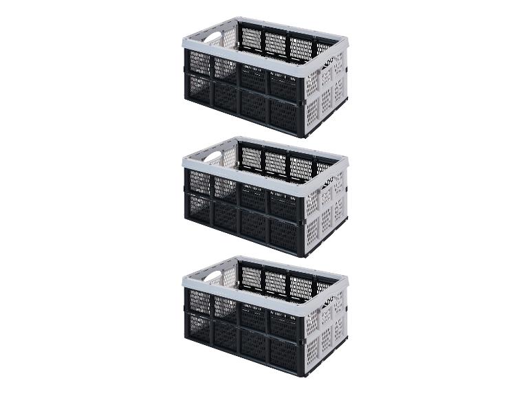 Trois caisses de rangement pliables noires et grises.
