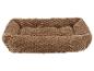Lit marron et doux pour animaux de compagnie avec un motif texturé.