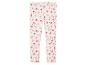 Leggings blanches avec un motif de papillons roses