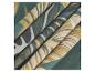 Tissus aux motifs tropicaux : tons verts et beiges.