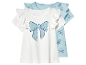 Deux t-shirts pour enfants avec des volants et un motif de nœuds.