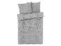 Une couette et des taies d'oreiller avec un motif paisley gris et blanc.