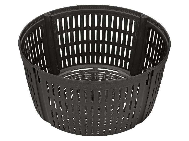 Panier en plastique noir avec fentes pour friteuse à air