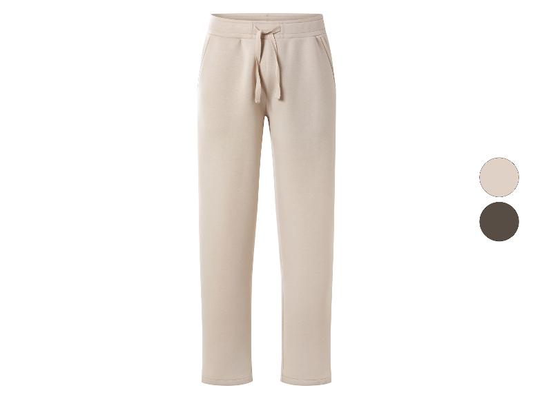 Pantalon de jogging beige avec cordon de serrage ajustable, disponible en beige et marron.