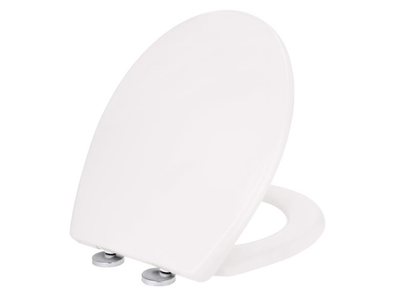 Abattant et siège de toilettes blancs