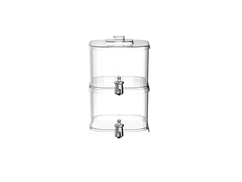Une carafe d'eau transparente avec deux robinets.