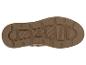 Semelle de chaussure marron avec motif antidérapant et un logo au centre.