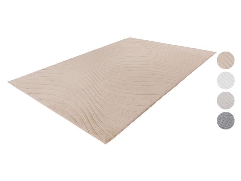 Tapis beige avec motif ondulé et échantillons de couleurs
