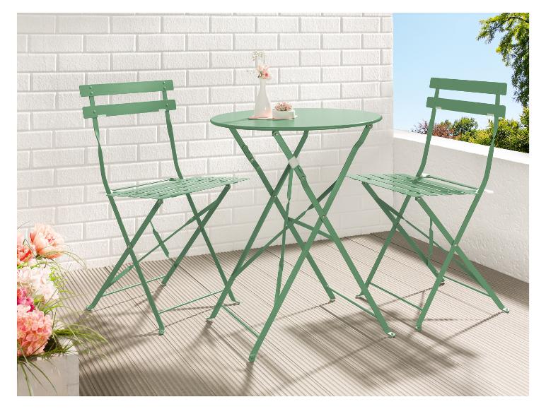 Un ensemble bistro vert avec une table ronde et deux chaises.