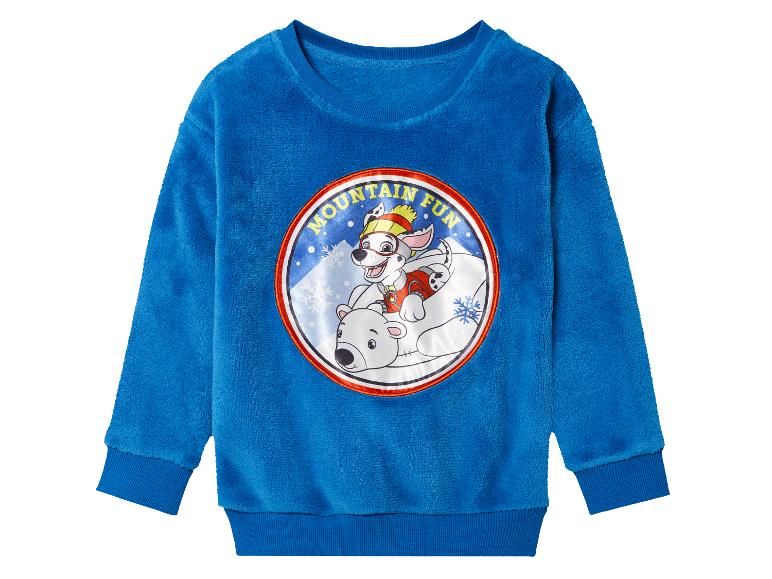 Un sweat-shirt en polaire bleu avec un motif Pat'Patrouille.