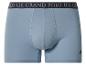 Caleçon boxer en coton bleu clair avec ceinture élastique foncée avec texte et logo cavalier.