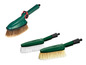 Trois brosses vertes avec le logo Parkside, adaptées pour laver les voitures