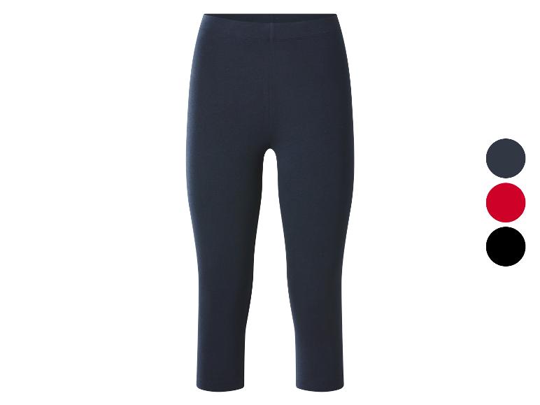 Legging 3/4 bleu foncé avec trois points de couleur : bleu foncé, rouge et noir.