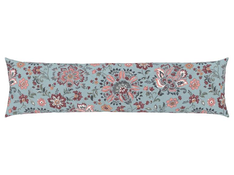 Un long coussin avec un motif floral.