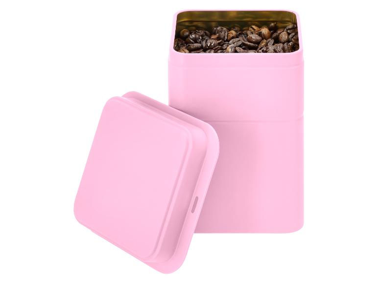 Boîte rose de grains de café avec couvercle
