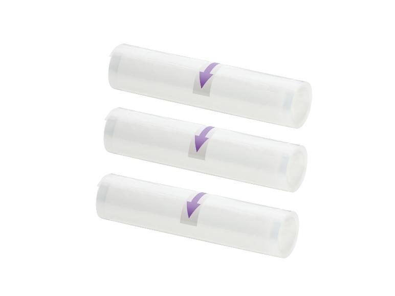 Trois rouleaux de sacs sous vide blancs avec des flèches violettes