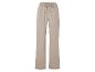 Pantalon beige ample à cordon de serrage.