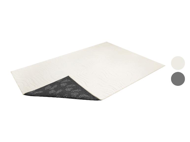 Tapis rectangulaire blanc cassé avec un motif abstrait et un revers antidérapant gris foncé