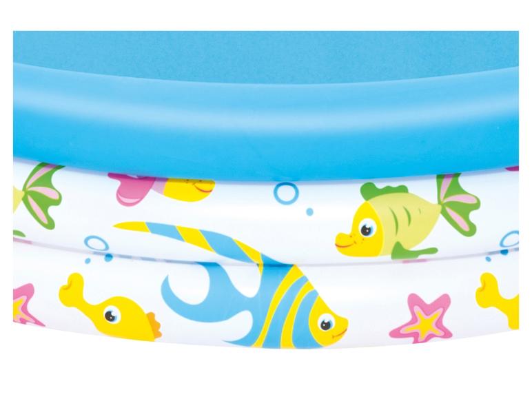 Piscine gonflable pour enfants, décor poissons et étoiles de mer.