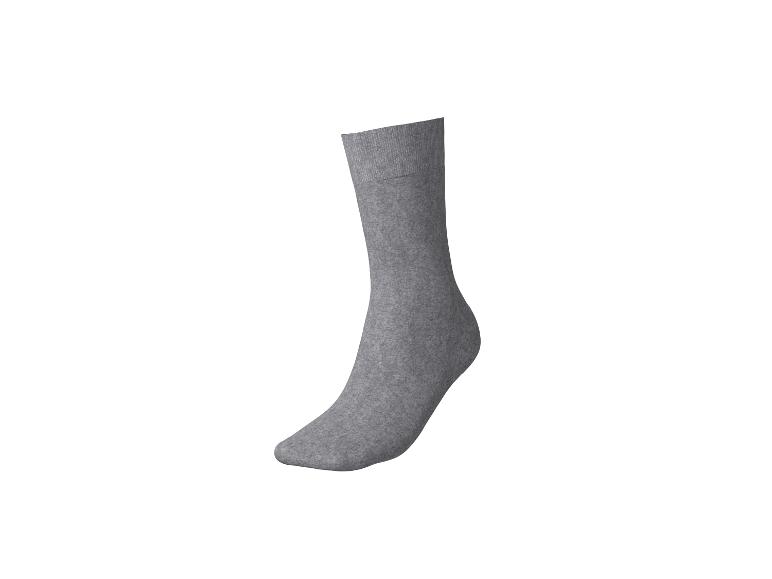 Une chaussette grise en tissu de coton, vue de côté.