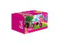 Tricycle Barbie rose avec un panier.