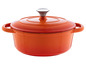 Une cocotte en fonte orange avec un couvercle.