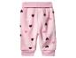 Pantalon de bébé en polaire rose avec des motifs de cœurs rose foncé, rose clair et blancs
