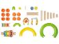 Jouets en bois à empiler avec des éléments de piste, y compris un xylophone et des balles avec des animaux.