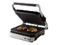 Gril électrique de contact avec deux steaks à l'intérieur