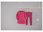 Un haut rose et un legging rayé pour fille.