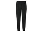Pantalon de survêtement noir avec ceinture élastique.