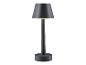 Une lampe de table grise avec un abat-jour rond.