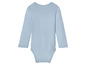 Un body bébé à manches longues de couleur bleu clair.