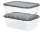 Deux récipients en plastique transparents empilés avec des couvercles gris.