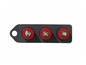 Trois bouchons de vis rouges dans un support gris.