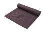 Un tapis de yoga gris foncé de la marque JetSport.