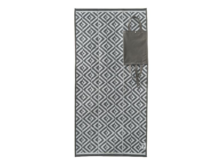 Tapis d'extérieur gris et blanc à motifs avec sac de transport gris foncé