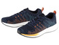 Deux paires de baskets bleues avec des détails orange et verts.