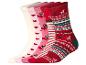 Cinq paires de chaussettes de Noël avec divers motifs, y compris des cœurs, des pingouins et des motifs festifs.